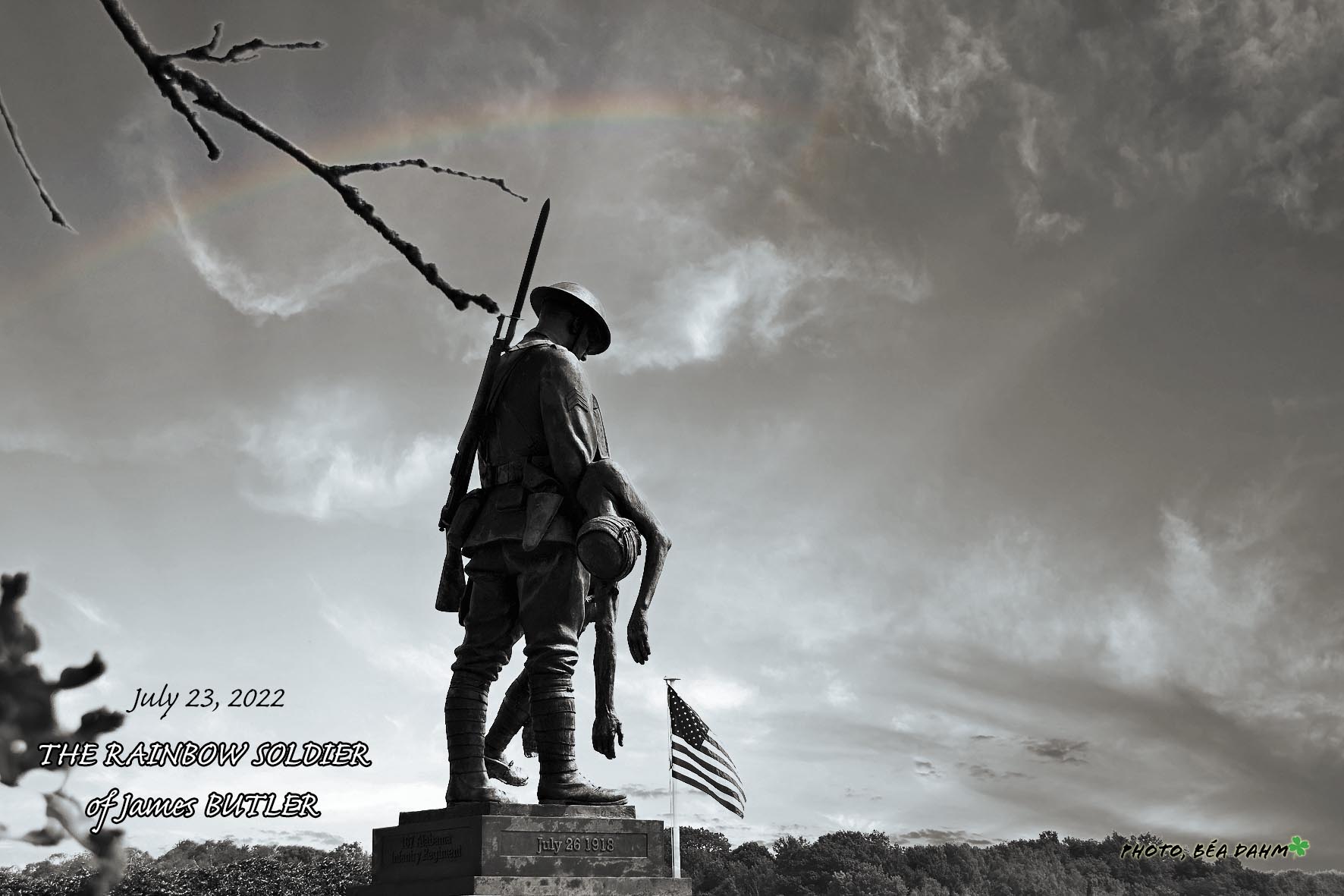 black and white shot of the monument with a rainbow