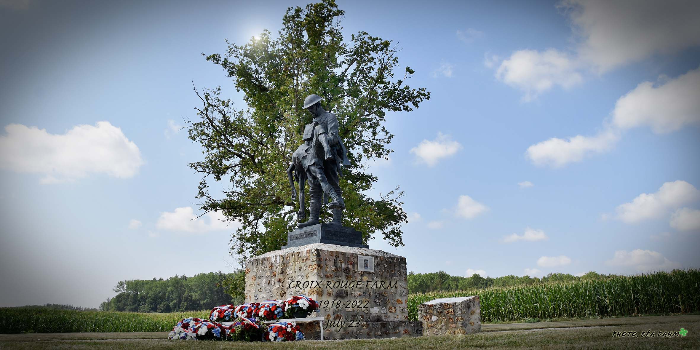 wreaths at the base of the monument