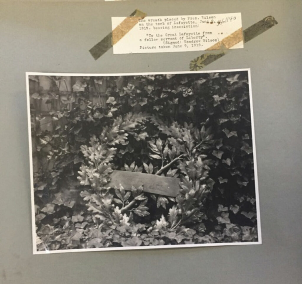 A photograph of a wreath at the tomb of Marquis de Lafayette